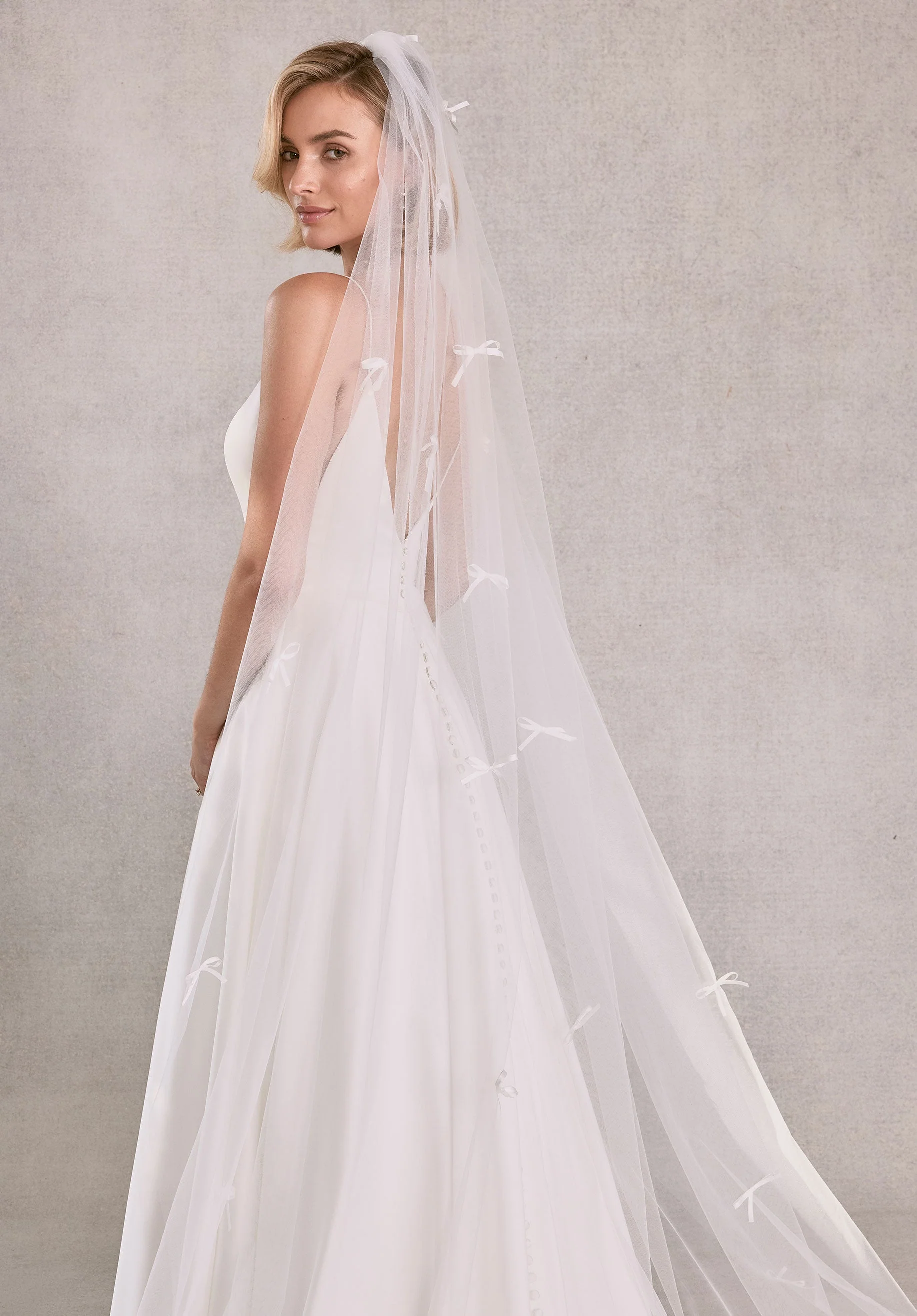 Cathedral Length Tulle Veil with Scattered Satin Bows